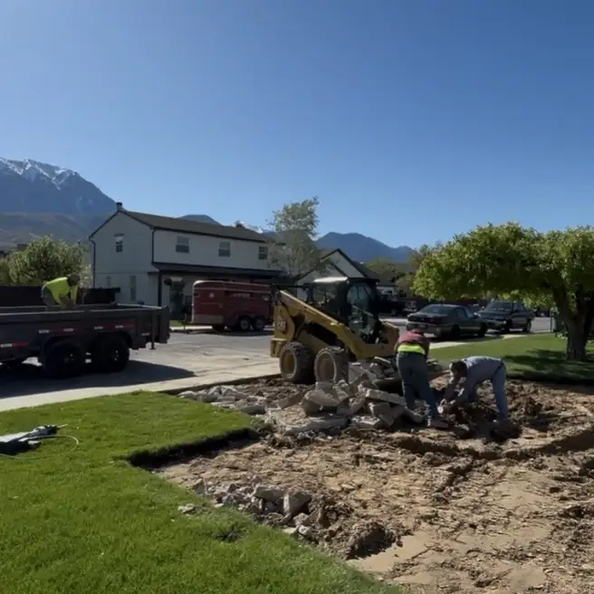Crew breaking out and removing old concrete