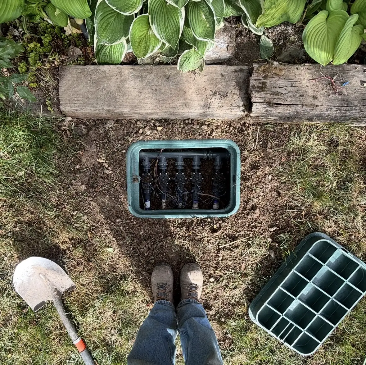 Opened sprinkler valve box ready for service